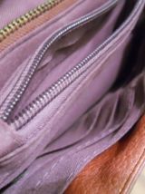 Pochette bandoulière avec chaines tête de mort bordeaux
