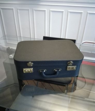 Valise noire vintage en bon état
