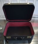 Valise noire vintage en bon état