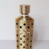 Etui en métal doré pour vaporisateur Guerlain