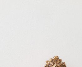 Miroir ancien ovale bronze doré