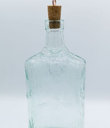 Bouteille en verre moulée homme