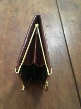 Ancien porte monnaie à soufflets en cuir marron façon croco.
