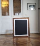Grand miroir en XX ème siècle résine noire et dorée 