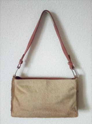 Sac Gérard Darel en cuir et fourrure 