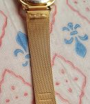 Montre LIP en métal doré