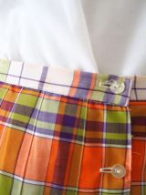 Mini jupe trapèze plissée motifs tartan  boutonnée 70's