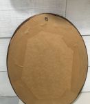 Cadre ovale en bois sculpté