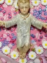 Christ sur un cœur mural kitsch et coloré avec chapelet