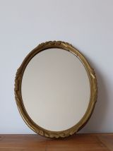 Miroir ovale en bois doré 