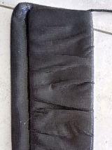 Pochette noire avec anse