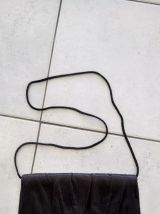 Pochette noire avec anse