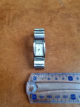 Montre Louis Pion pour femme tout acier inox. Bon état