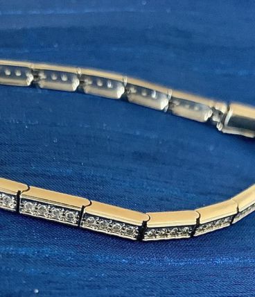 Bracelet articulé Or 18 k et diamants 