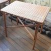 Table en rotin et piètement bambou 