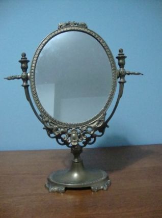 Miroir psyché pivotant en bronze doré patiné
