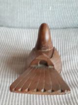 Oiseau ancien en bois sculpté