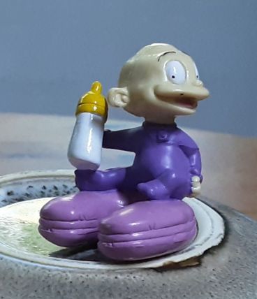 Figurine Tommy  et son biberon 