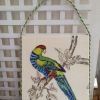 Tableau tapisserie sur bois motif perroquet