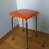 Tabouret skaï orange et métal chromé années 70