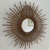 Miroir vintage 1960 soleil étoile asymétrique rotin - 52 cm