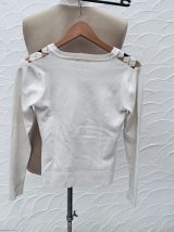 Pull femme à damiers
