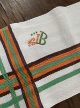 Serviettes de table vintage en orange et vert.