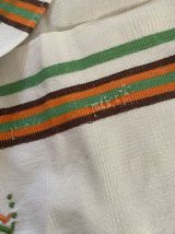 Serviettes de table vintage en orange et vert.