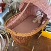 Berceau en rotin vintage