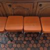 4 Tabourets vintage 60's en skaï orange
