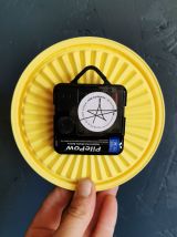 Horloge pendule murale vintage silencieuse Tupperware jaune