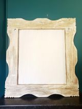 Grand miroir en bois doré 