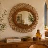 Miroir vintage 1960 soleil fleur rotin osier - 68 x 58 cm