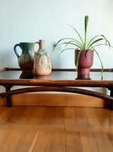 Grande table basse en rotin et verre fumé 1960 