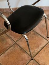 Lot de 2 chaises vintage. 1960. Pieds compas et skaï noir