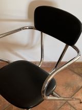 Lot de 2 chaises vintage. 1960. Pieds compas et skaï noir