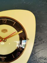 Horloge formica vintage pendule murale Jura jaune