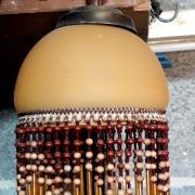 Suspension opaline ocre  franges perles 