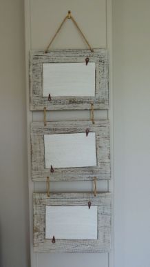 3 cadres photo en bois reliés par de la corde