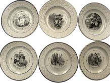 11 assiettes plates ornées de Scènes militaires. Man