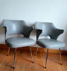 Paire de fauteuils design skaï et capitons, vers 1960 