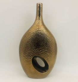 Vase en céramique doré.