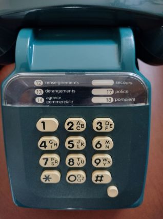 Ancien téléphone bleu vintage à touches Socotel