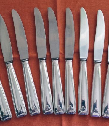 12 couteaux  à dessert en métal argenté